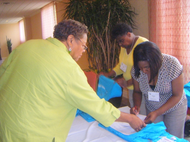 Registration-Allean Beene Ellison receiving her T-shirt